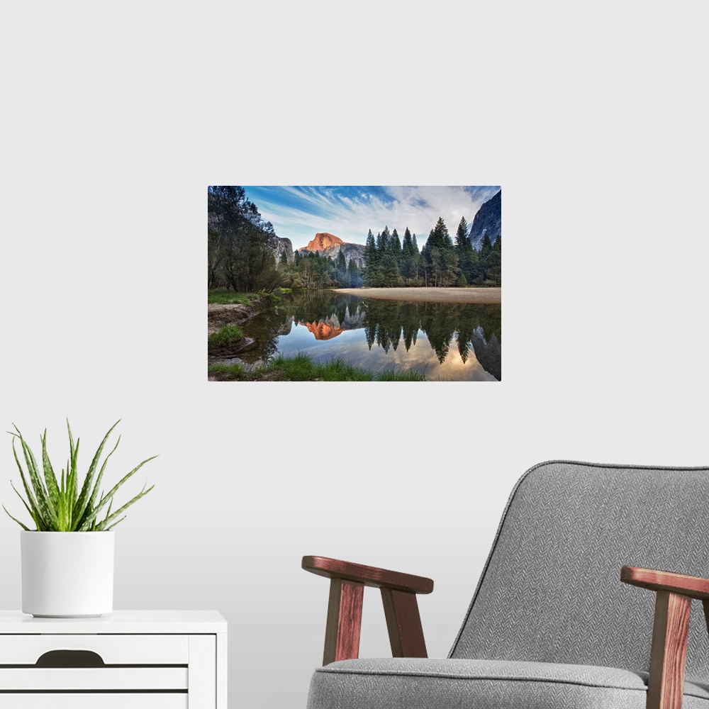 A modern room featuring Half Dome reflecting in  Merced river in Yosemite National Park.