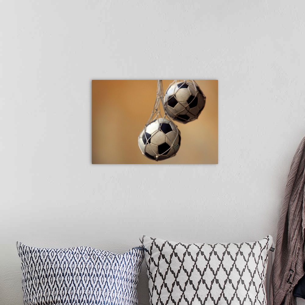 A bohemian room featuring Hanging soccer balls