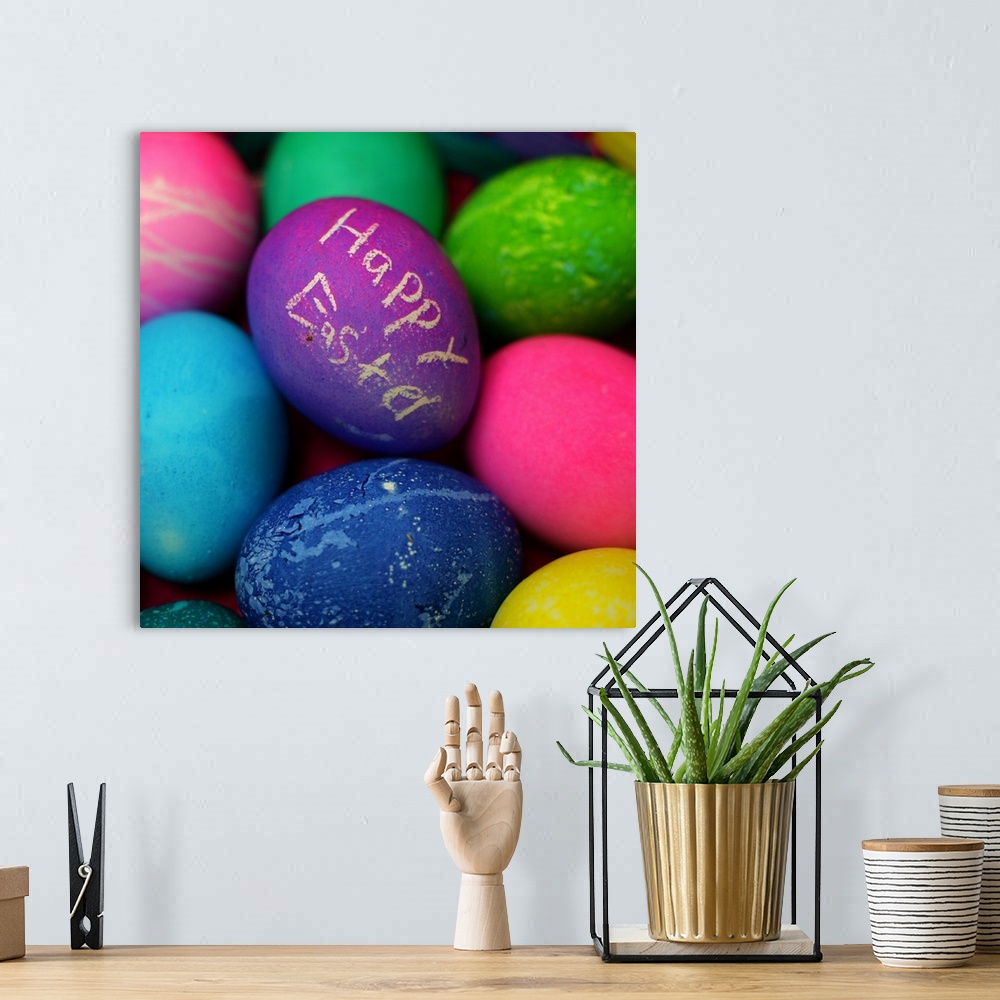 A bohemian room featuring Dyed Easter eggs with crayon greeting message.