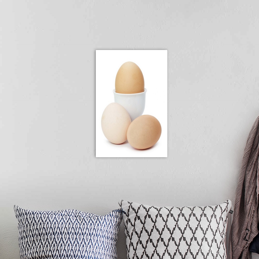 A bohemian room featuring Three eggs isolated on a white background