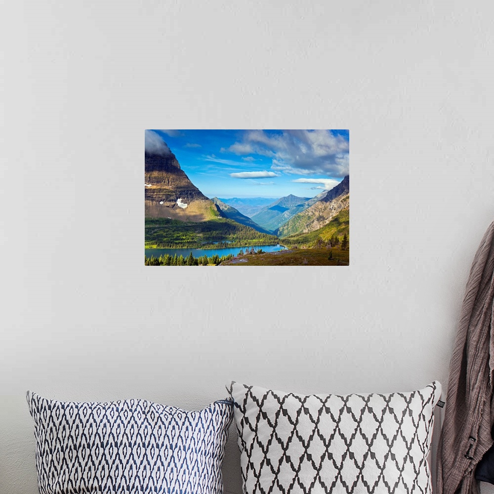 A bohemian room featuring Large, landscape photograph of  Hidden Lake from an overlook, surrounded by mountains in Glacier ...