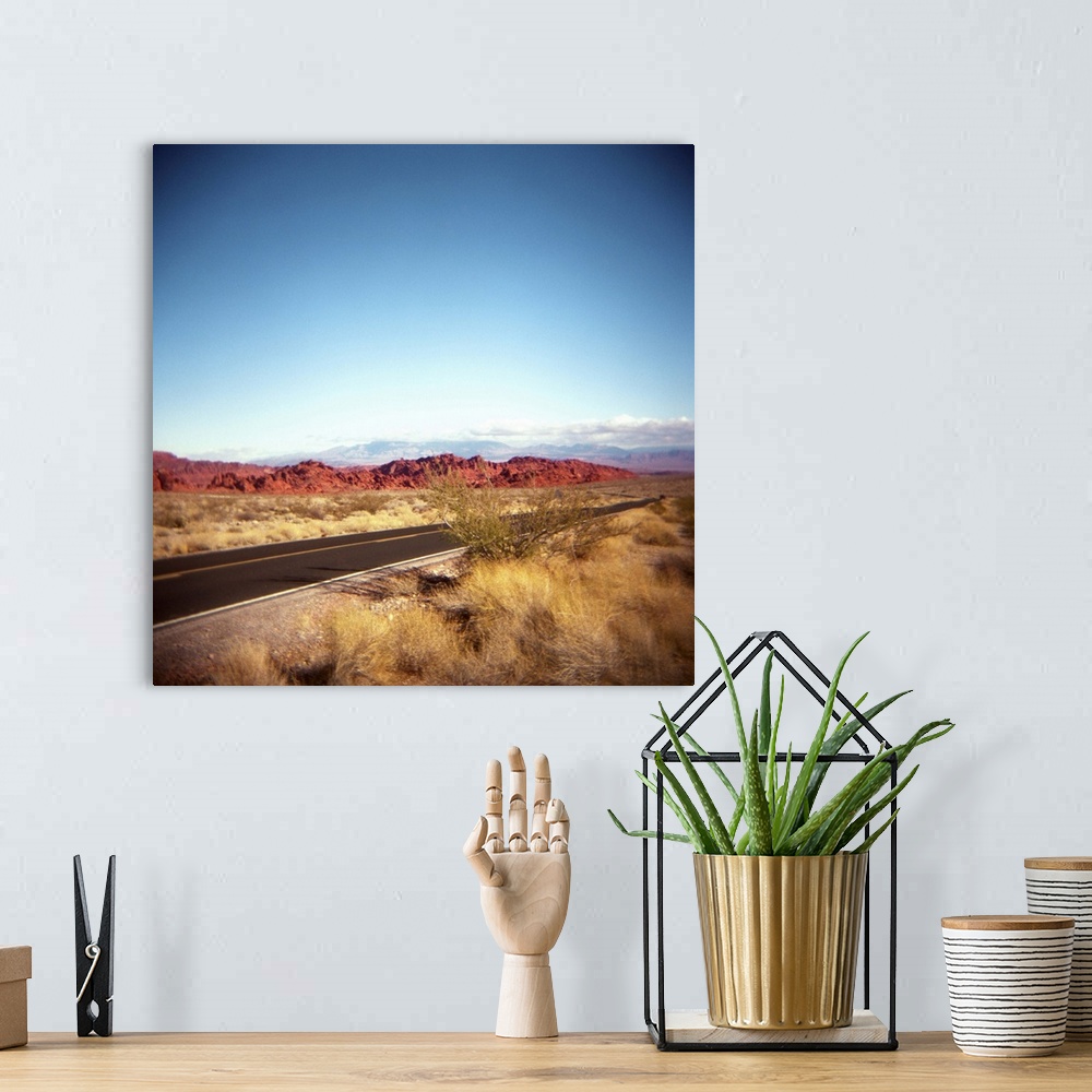 A bohemian room featuring Photo of the highway entering the Valley of Fire in Nevada.  Near Las Vegas.  Red rocks.  Desert....