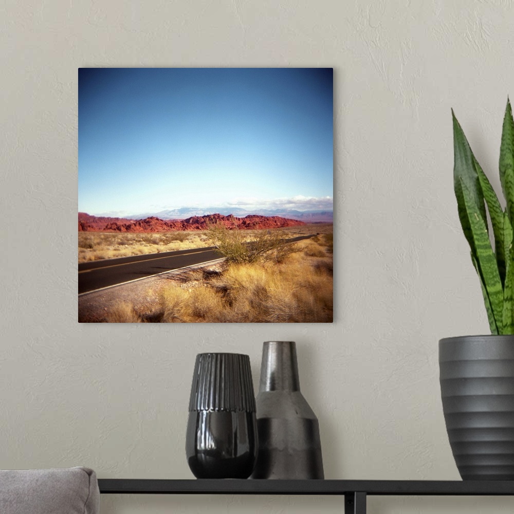 A modern room featuring Photo of the highway entering the Valley of Fire in Nevada.  Near Las Vegas.  Red rocks.  Desert....
