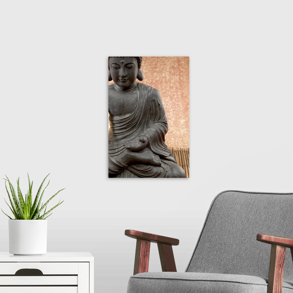 A modern room featuring Hindu Buddha statue