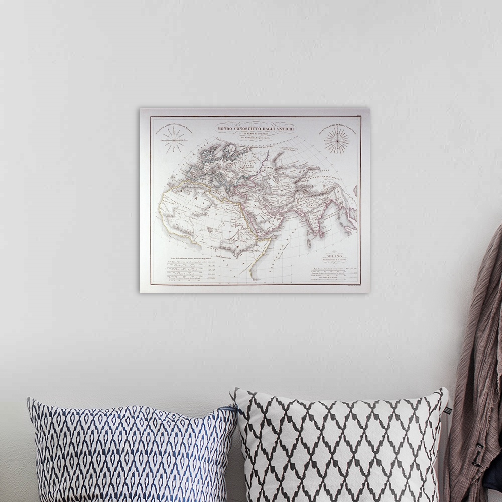 A bohemian room featuring Antique world map showing the continents with longitude and latitude grid lines.  There are also ...