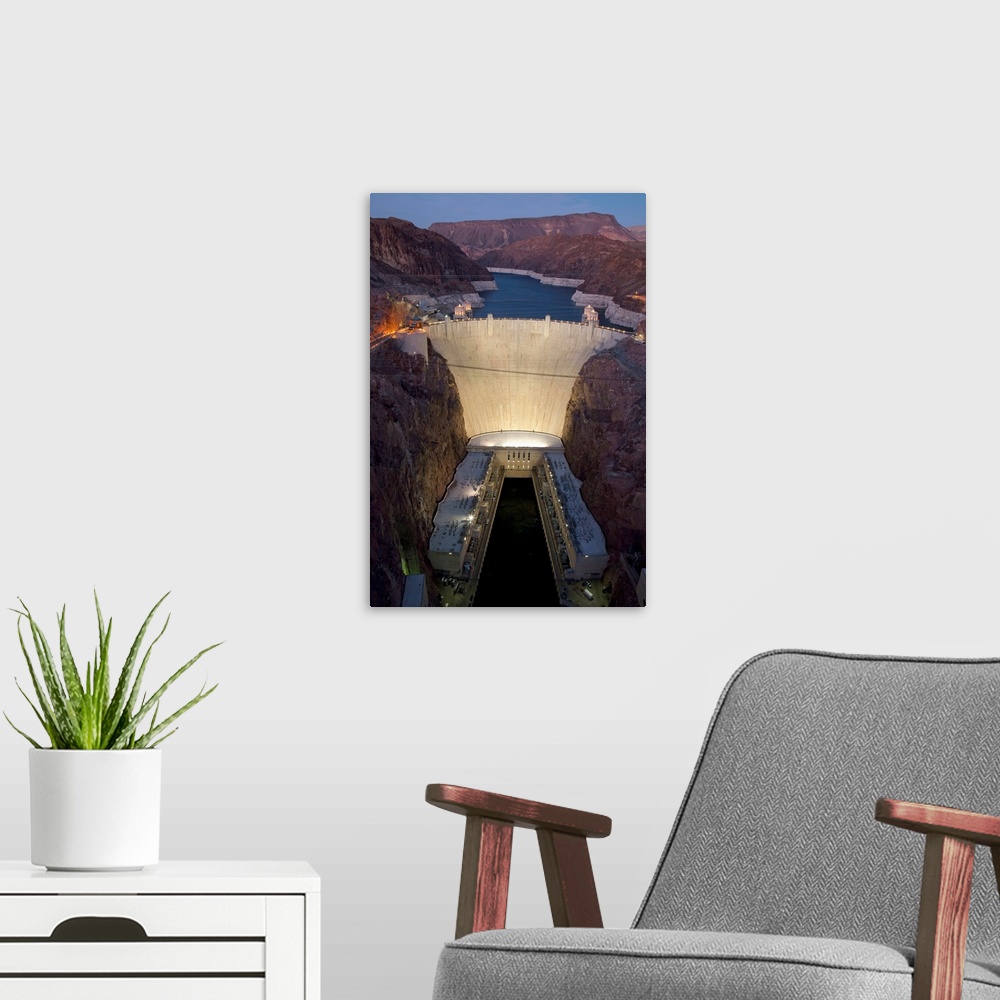 A modern room featuring Elevated view at dusk of Hoover Dam (formerly Boulder dam) and Lake Mead is in the Black Canyon o...