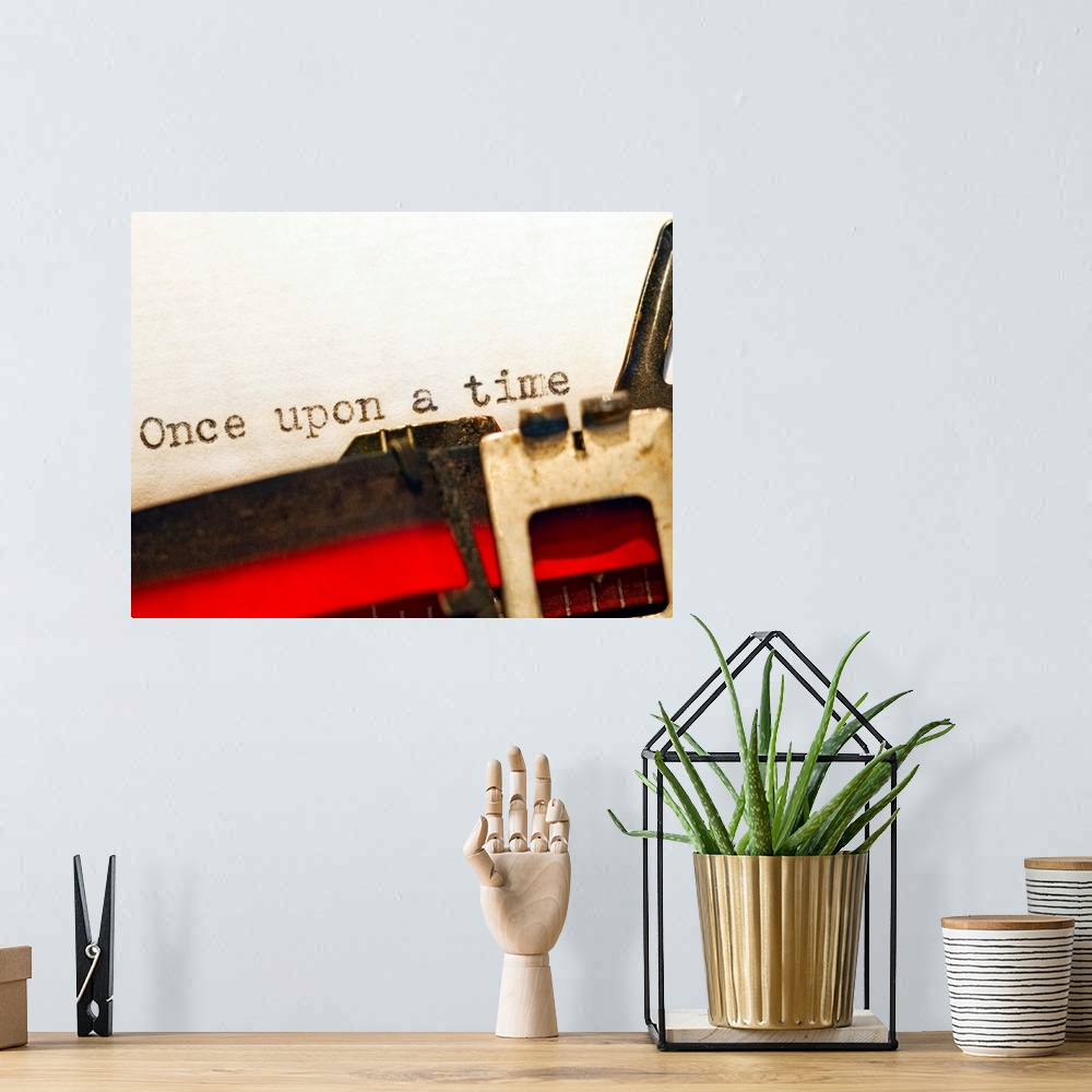 A bohemian room featuring This horizontal photograph is a close up of text recently typed by a typewriter on the page repea...
