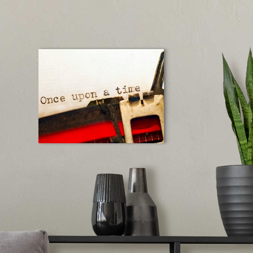 A modern room featuring This horizontal photograph is a close up of text recently typed by a typewriter on the page repea...