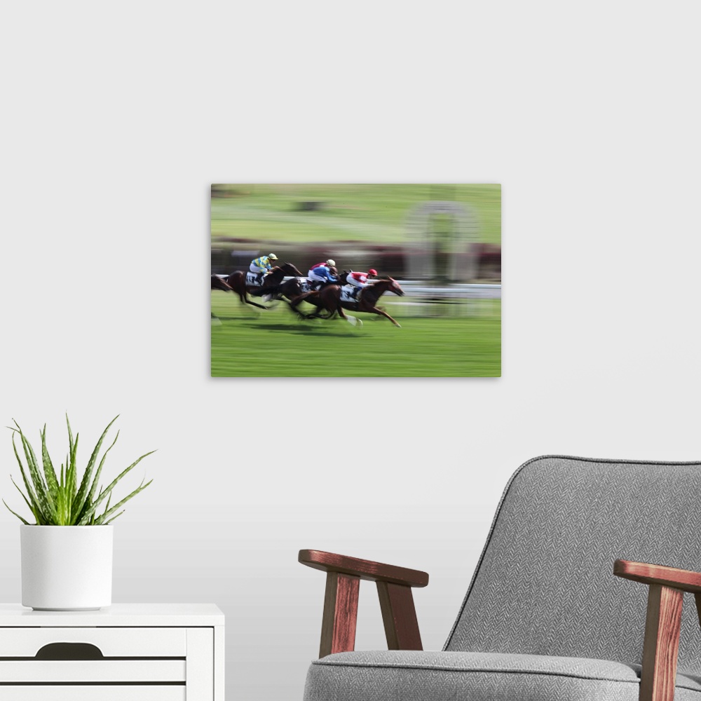 A modern room featuring Horse race - blurred motion