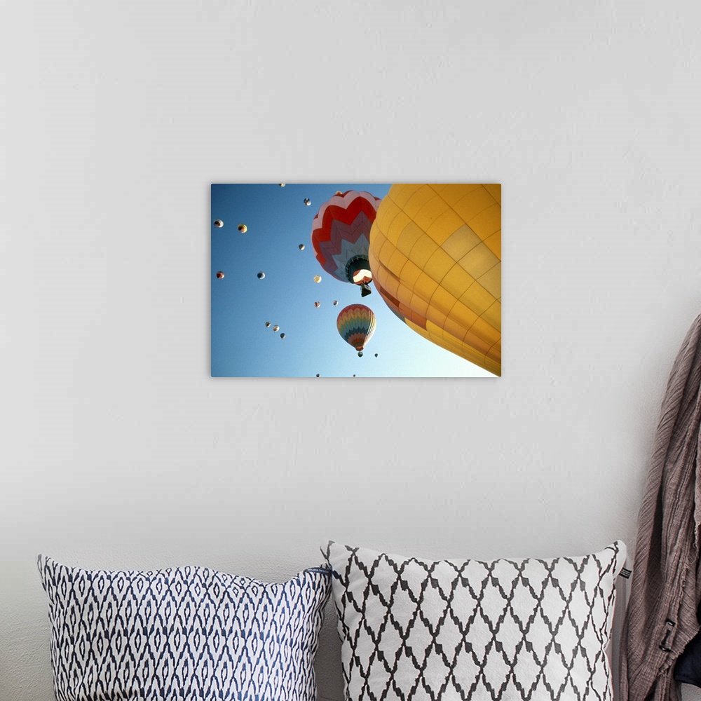 A bohemian room featuring Hot air balloons floating in sky