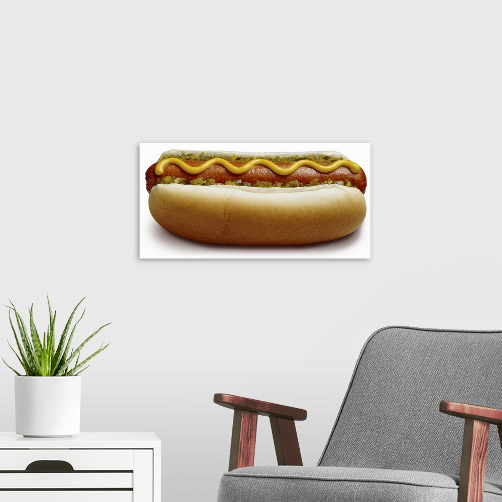 A modern room featuring Hot dog with mustard and relish, close-up