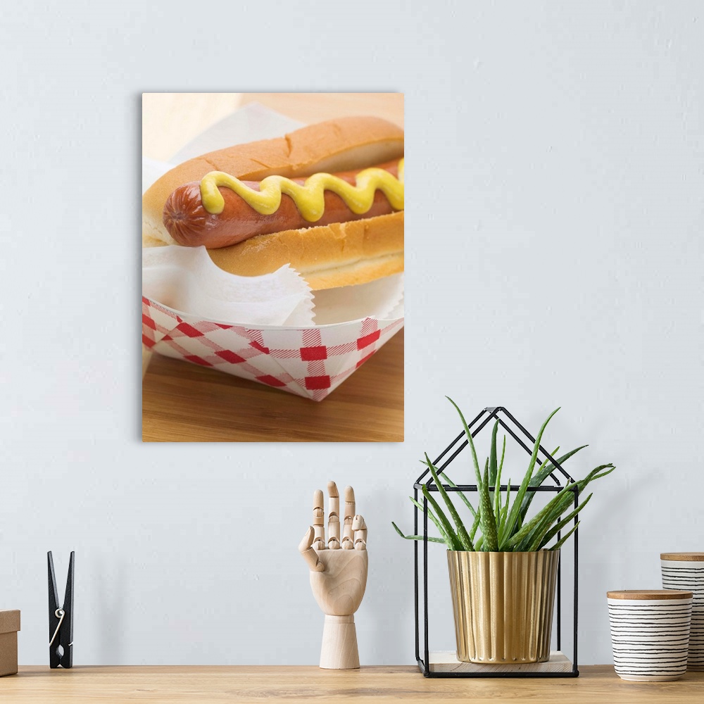A bohemian room featuring Hot dog with mustard in paper dish