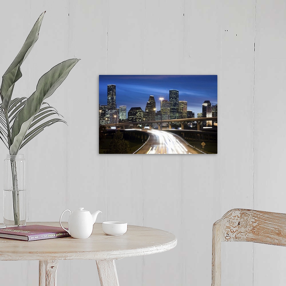 A farmhouse room featuring Houston skyline at dusk with freeway in foreground