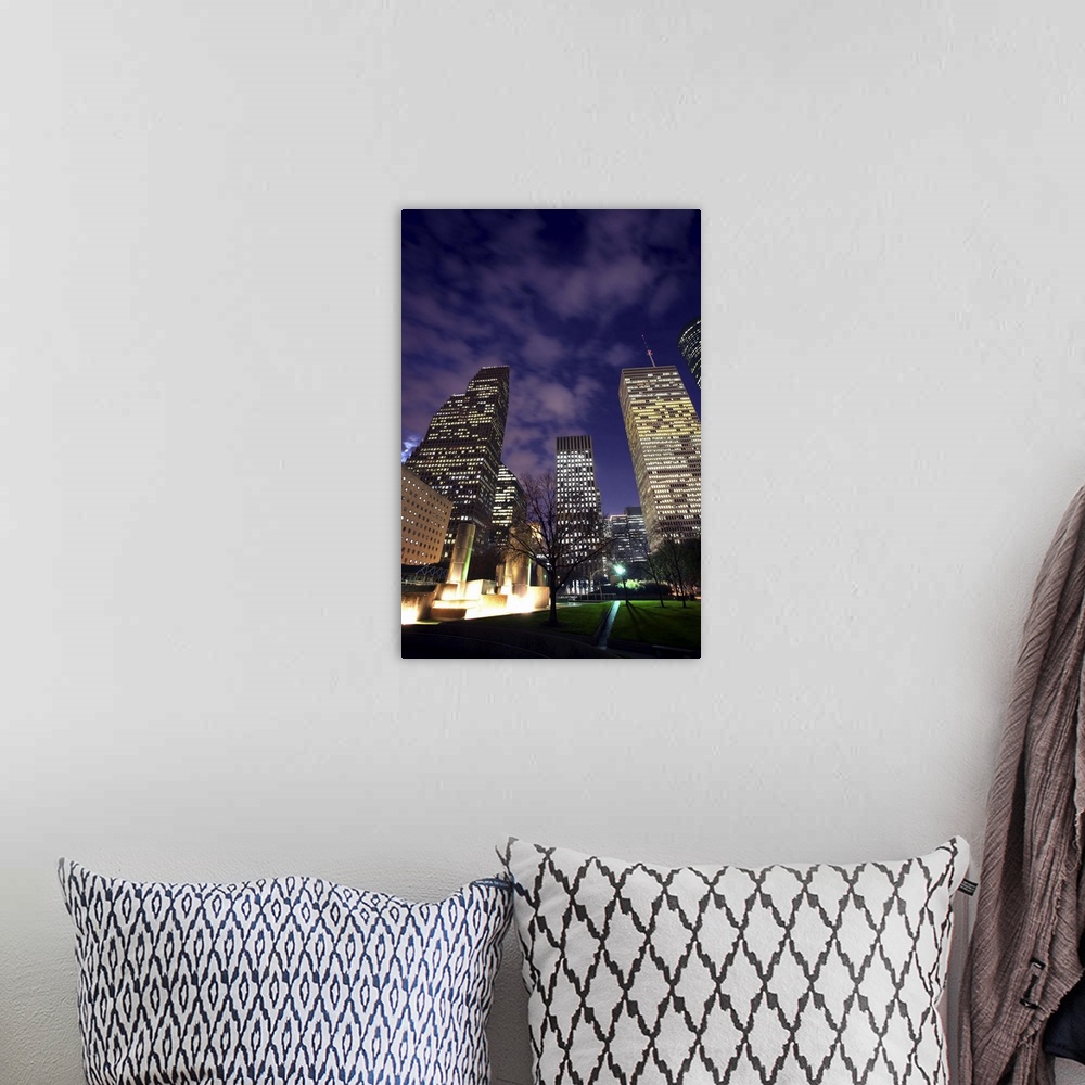 A bohemian room featuring Houston skyline at night