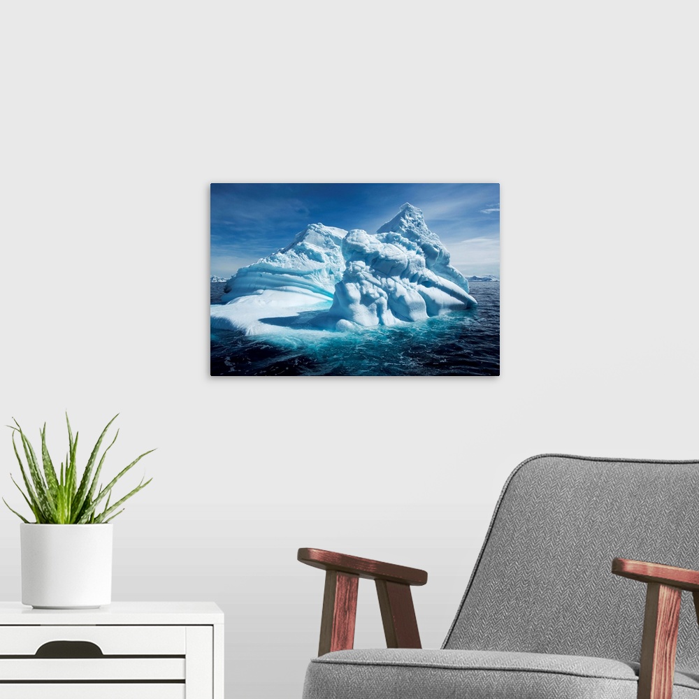 A modern room featuring Antarctica, Iceberg floating near mountainous coast by Gerlache Strait along Antarctic Peninsula