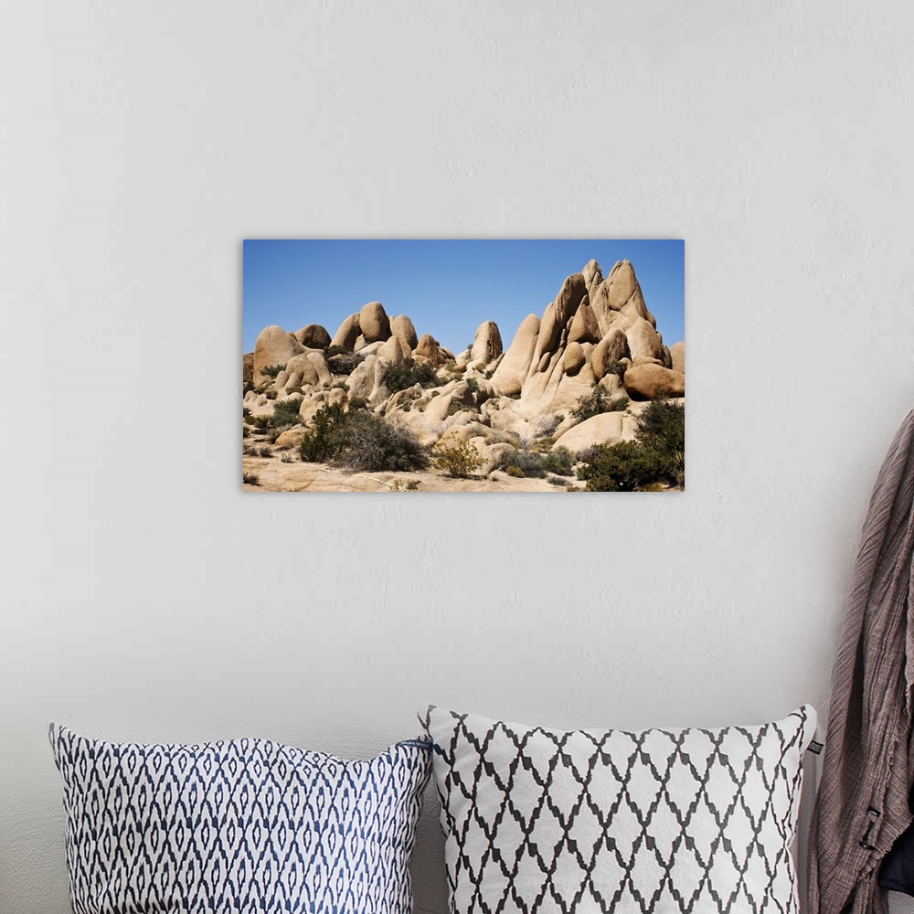 A bohemian room featuring Rock formations of Joshua Tree National Park in California.