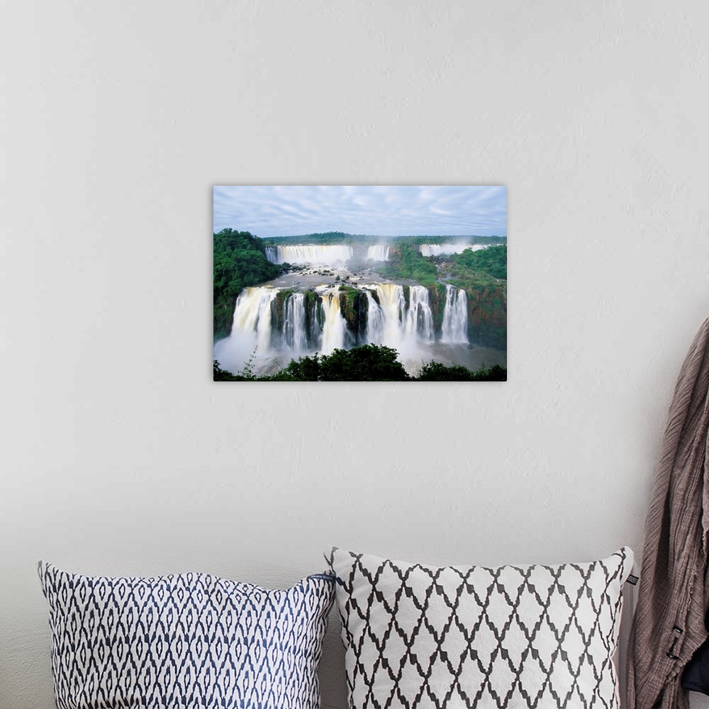 A bohemian room featuring A view of the Iguazu Waterfalls located in the Parque Nacional Iguazu in Brazil and Argentina.