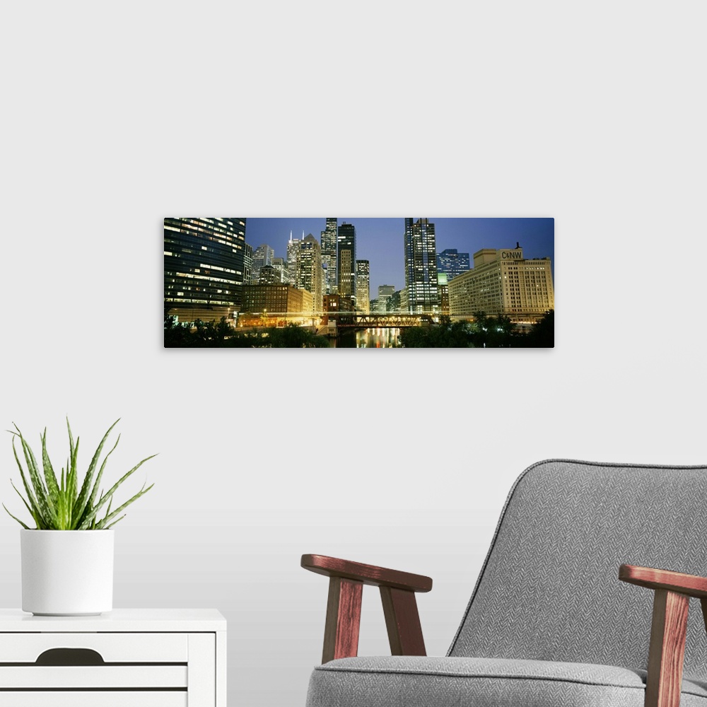 A modern room featuring USA, Illinois, Chicago, skyline at night