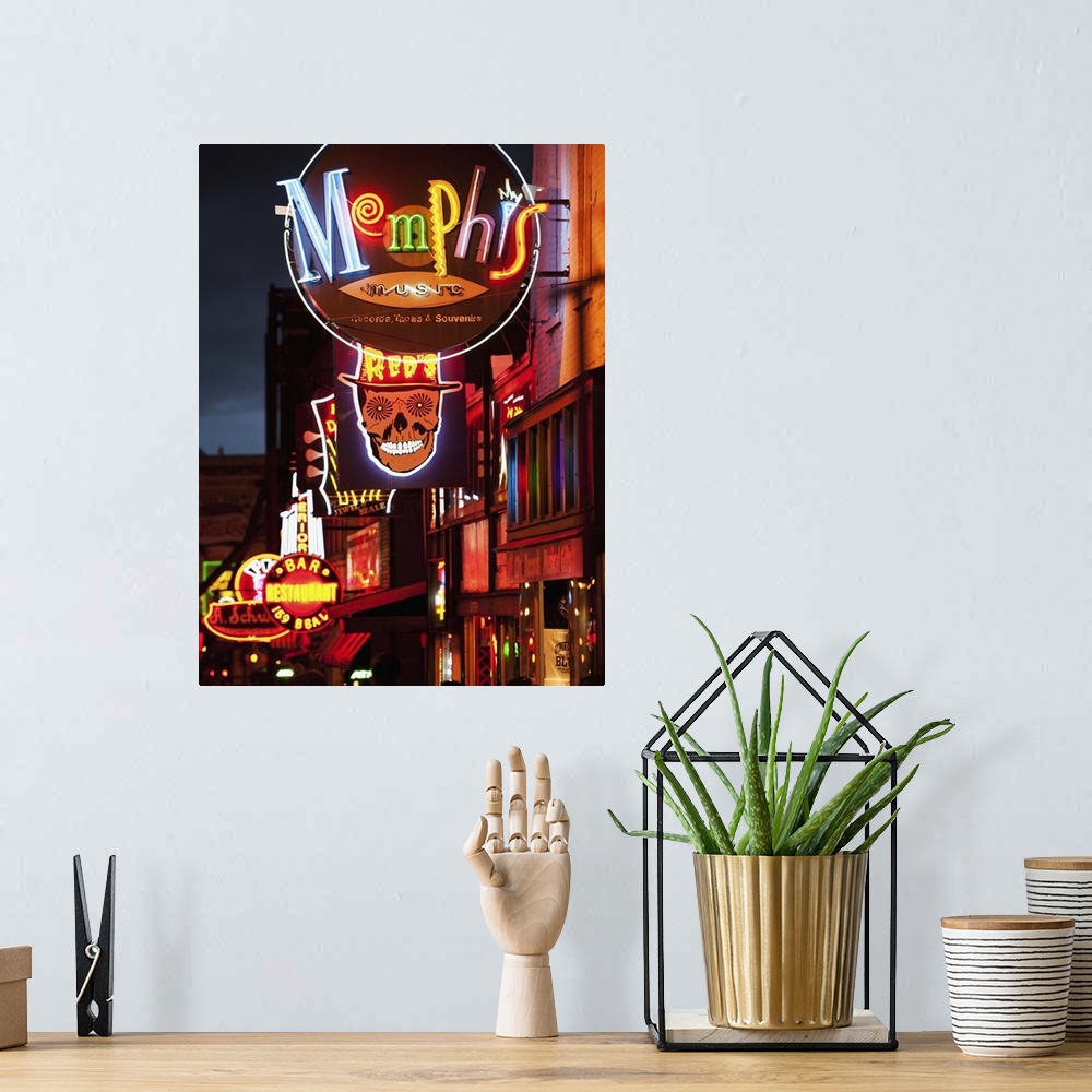 A bohemian room featuring Illuminated bar signs on Beale Street in Memphis