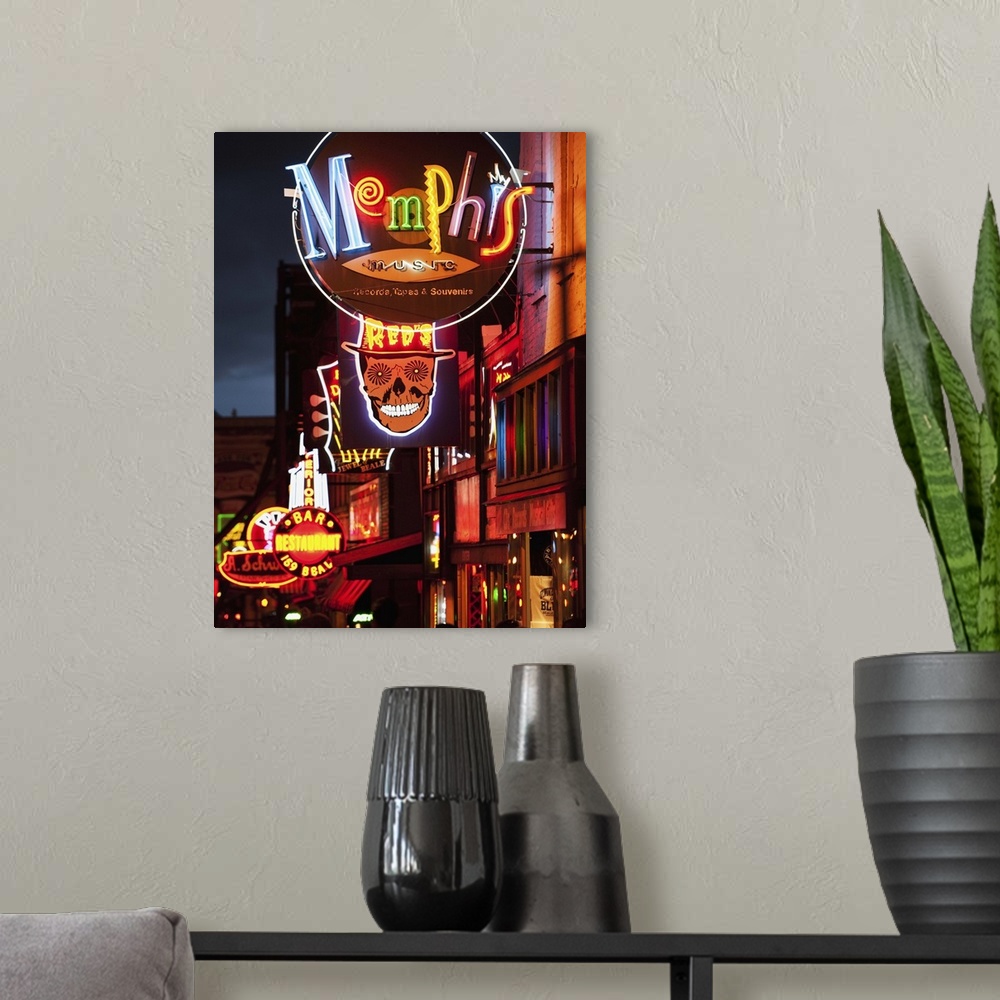 A modern room featuring Illuminated bar signs on Beale Street in Memphis