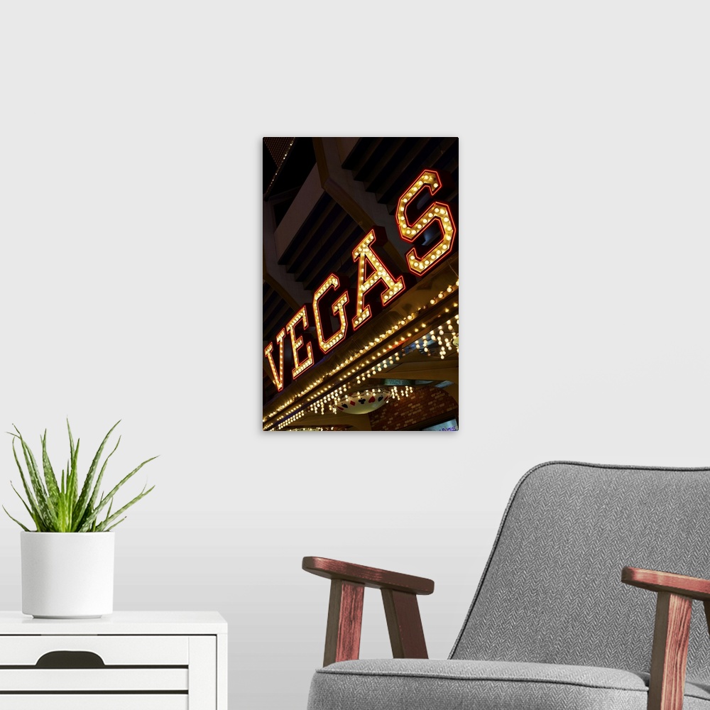 A modern room featuring Illuminated Vegas sign