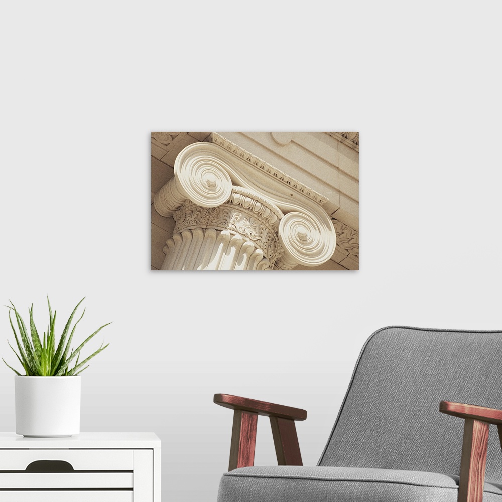 A modern room featuring Big canvas print of the up close view of the details etched into a column.