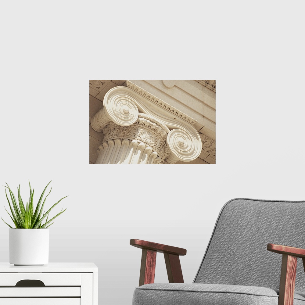 A modern room featuring Big canvas print of the up close view of the details etched into a column.