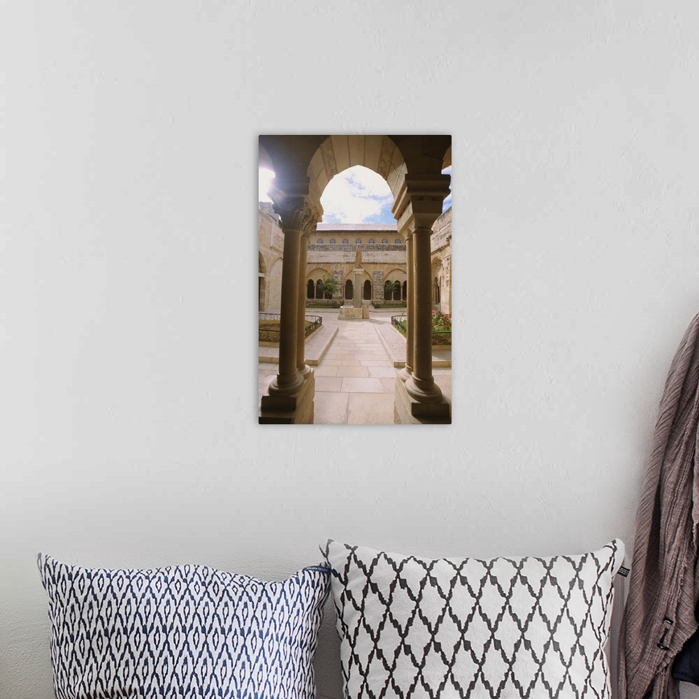 A bohemian room featuring Israel, Bethlehem, St. Catherine Church, Cloister, Arched doorway in a church building