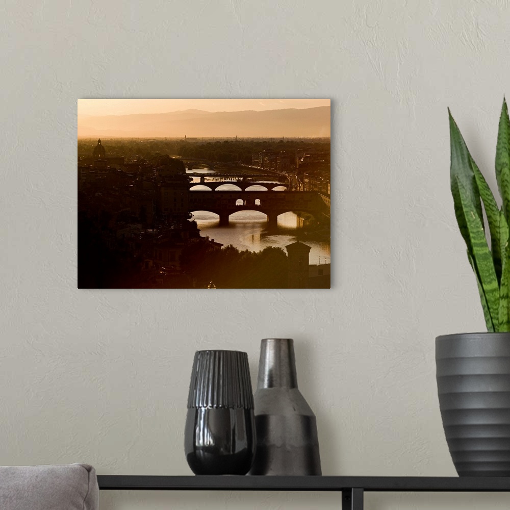 A modern room featuring Italy, Florence, Ponte Vecchio and River Arno at sunset