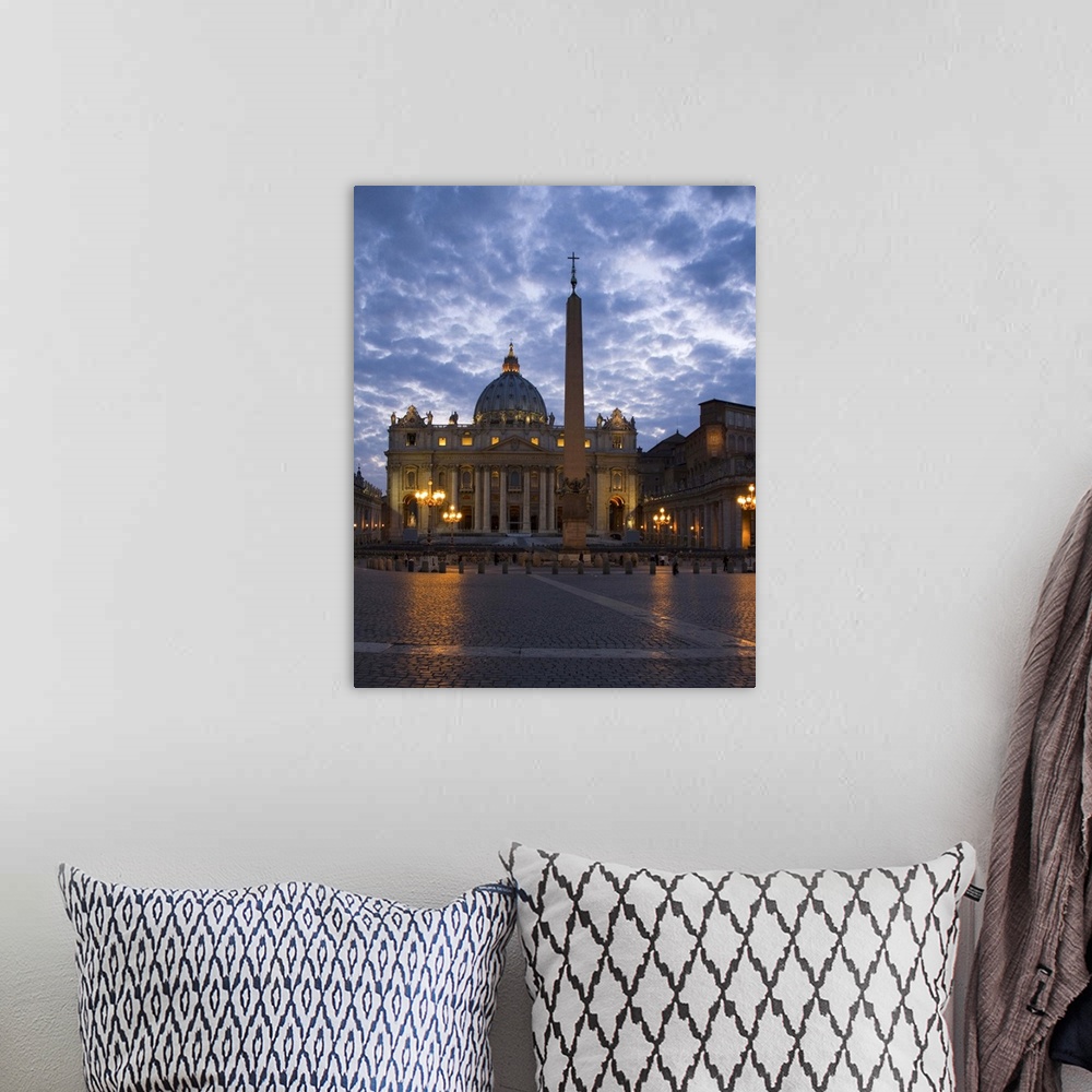 A bohemian room featuring Italy, Rome, Vatican City, St. Peter's Basilica illuminated at dusk