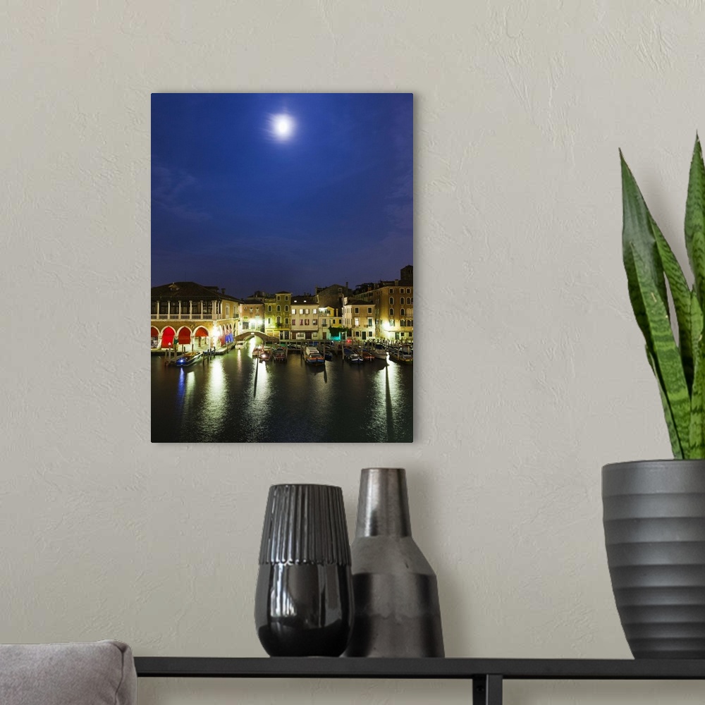 A modern room featuring Italy, Venice cityscape at dusk