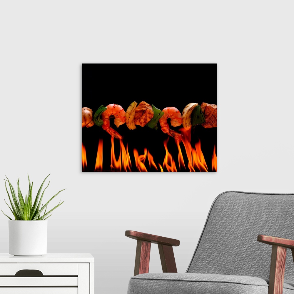 A modern room featuring Kabob over flames