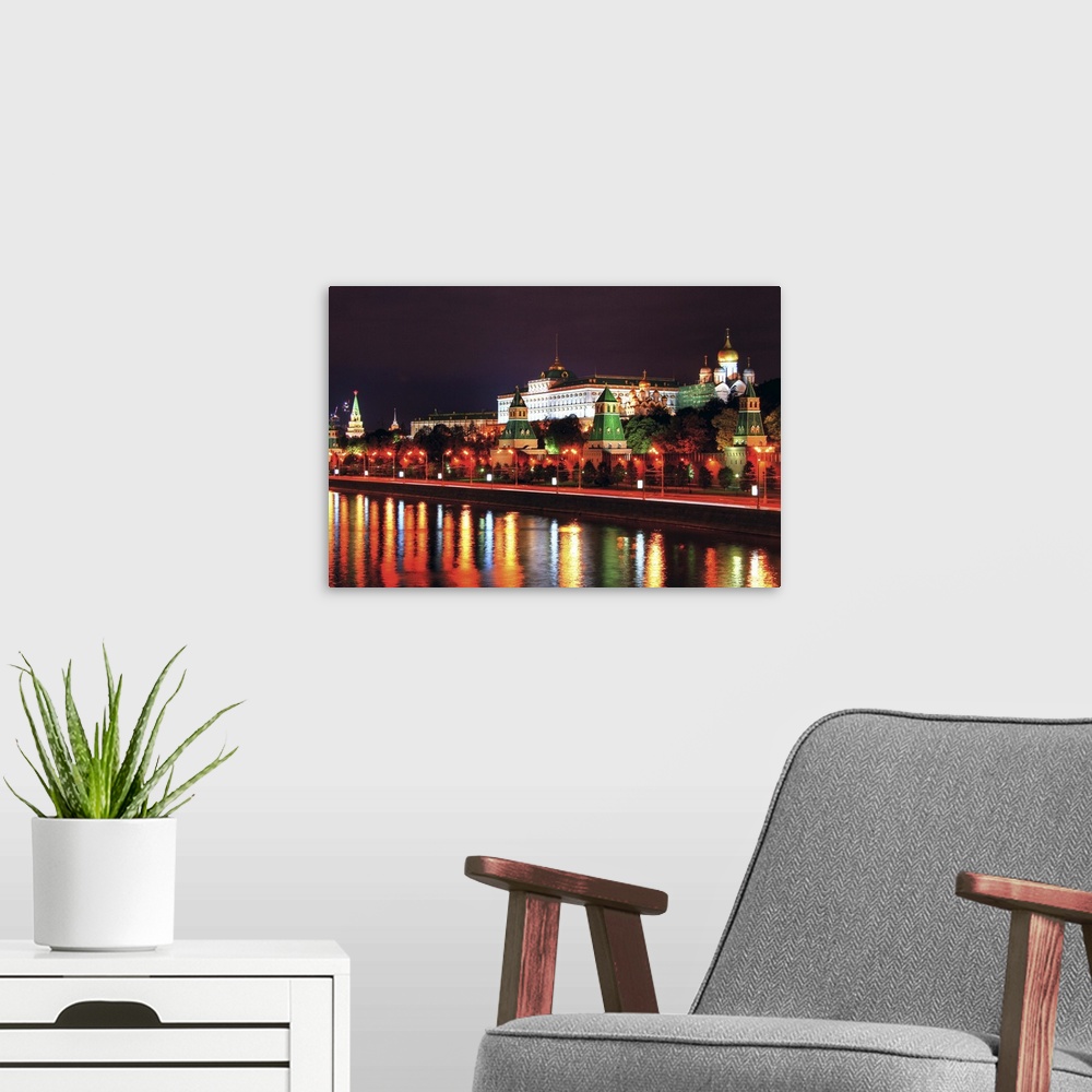 A modern room featuring Kremlin in Moscow in front of river Moskva. Parliament and Moscow's number 1 tourist attraction. ...