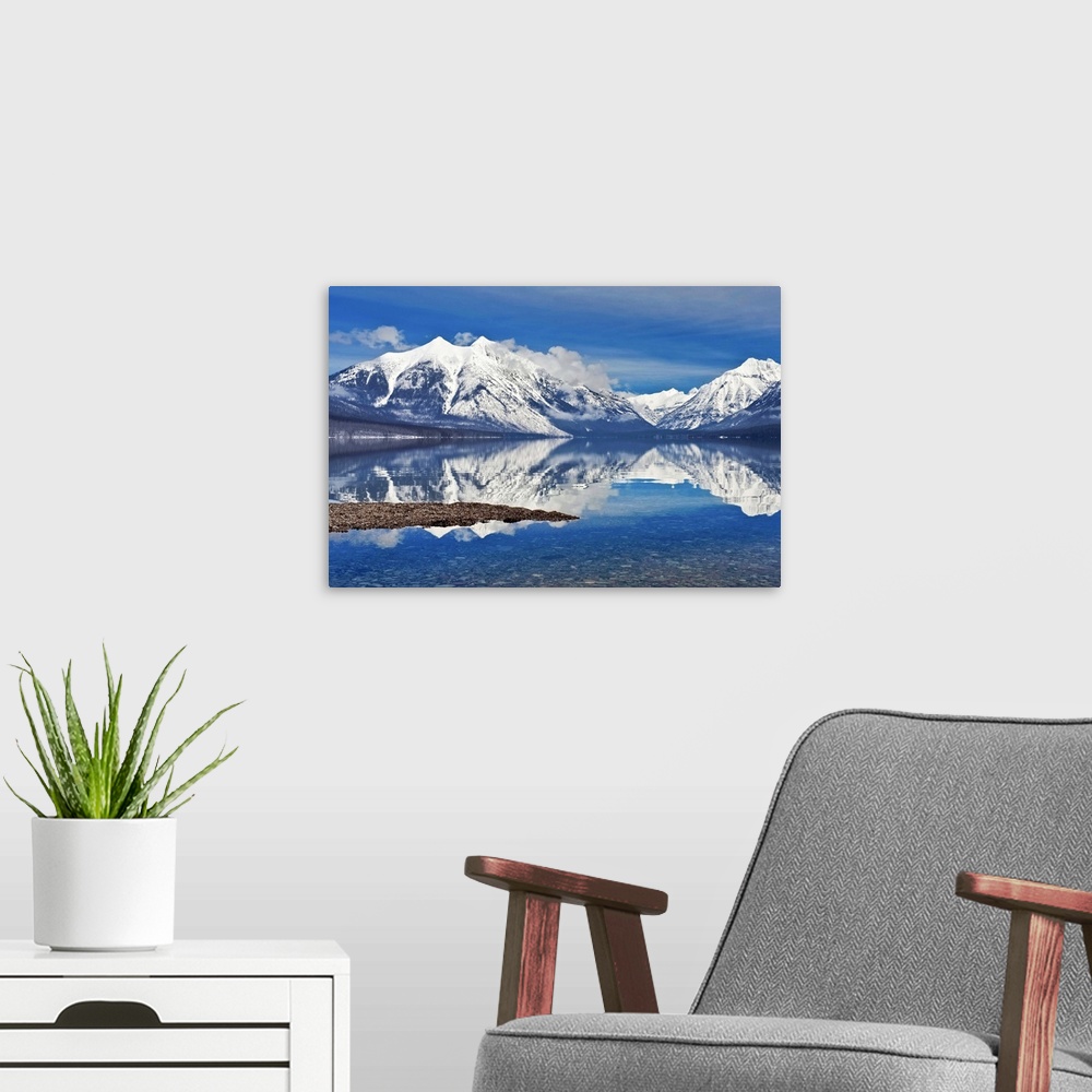 A modern room featuring Lake McDonald, Glacier national park as fog lifted.