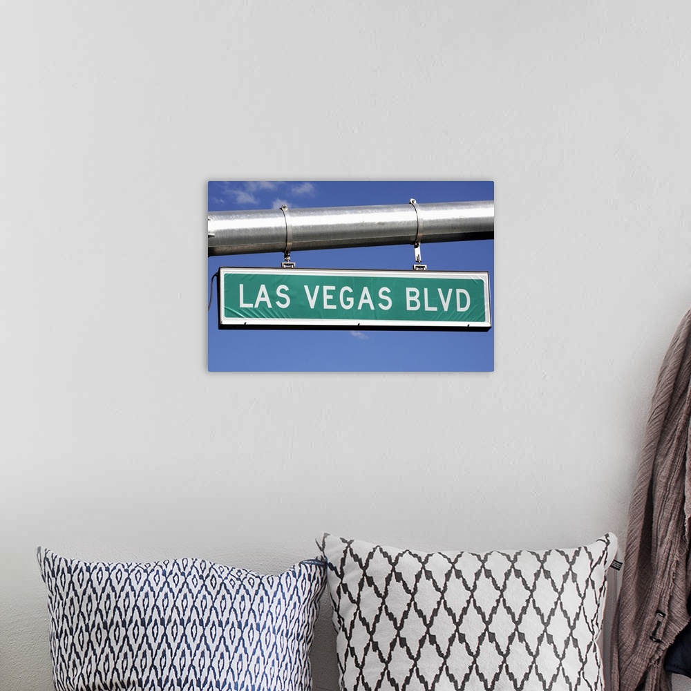A bohemian room featuring Las Vegas Boulevard street sign - The Strip