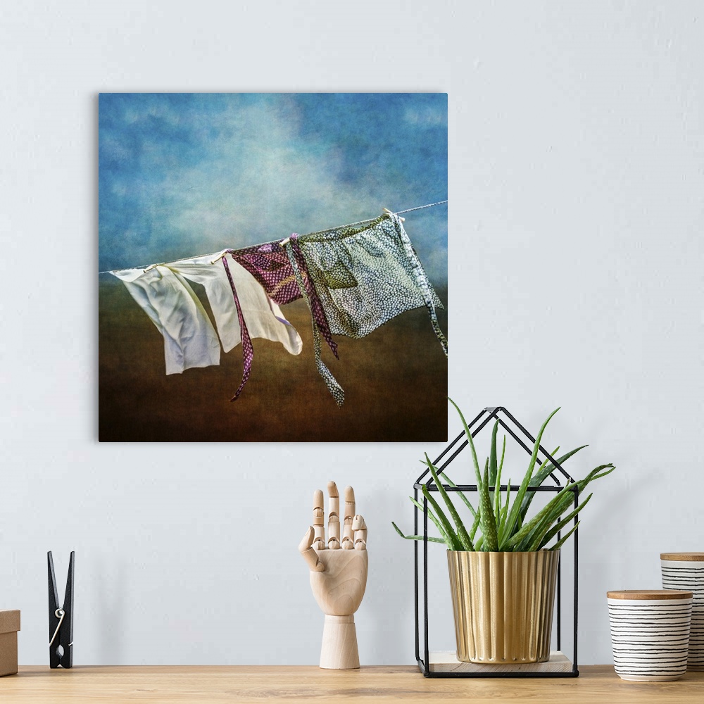 A bohemian room featuring Laundry blowing in the wind .Creative retro feel, artistic texture effect