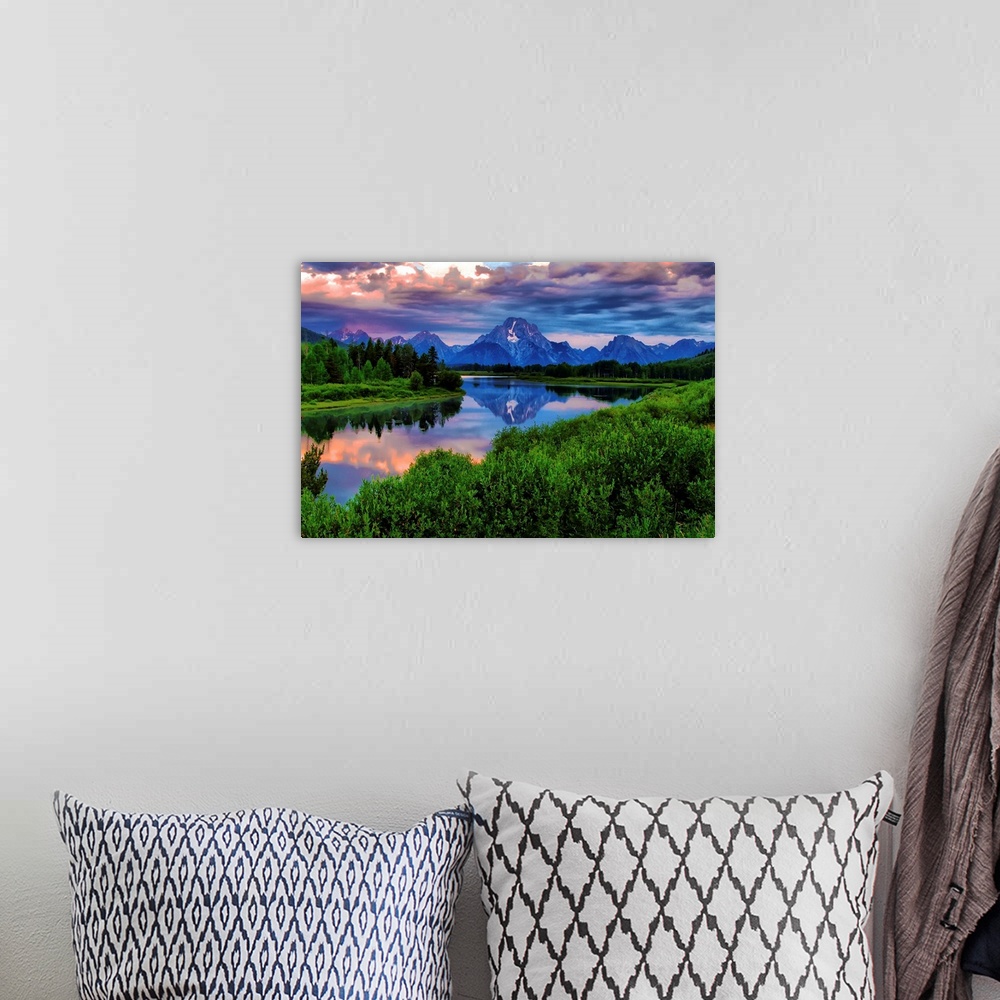A bohemian room featuring Giant, landscape photograph of morning light breaking through a stormy cloud cover over the Snake...