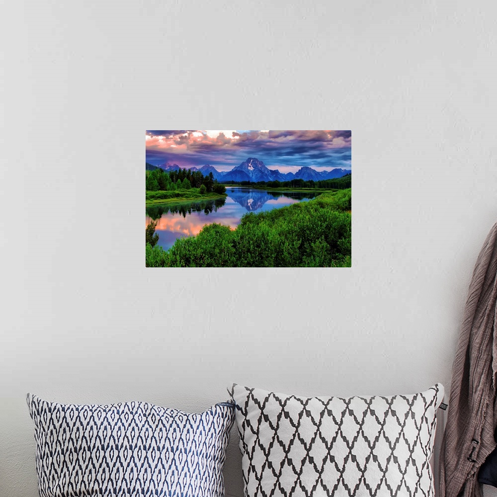 A bohemian room featuring Giant, landscape photograph of morning light breaking through a stormy cloud cover over the Snake...