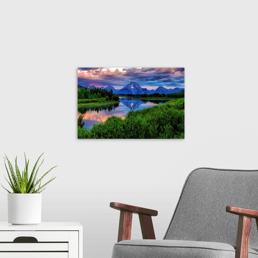 A modern room featuring Giant, landscape photograph of morning light breaking through a stormy cloud cover over the Snake...