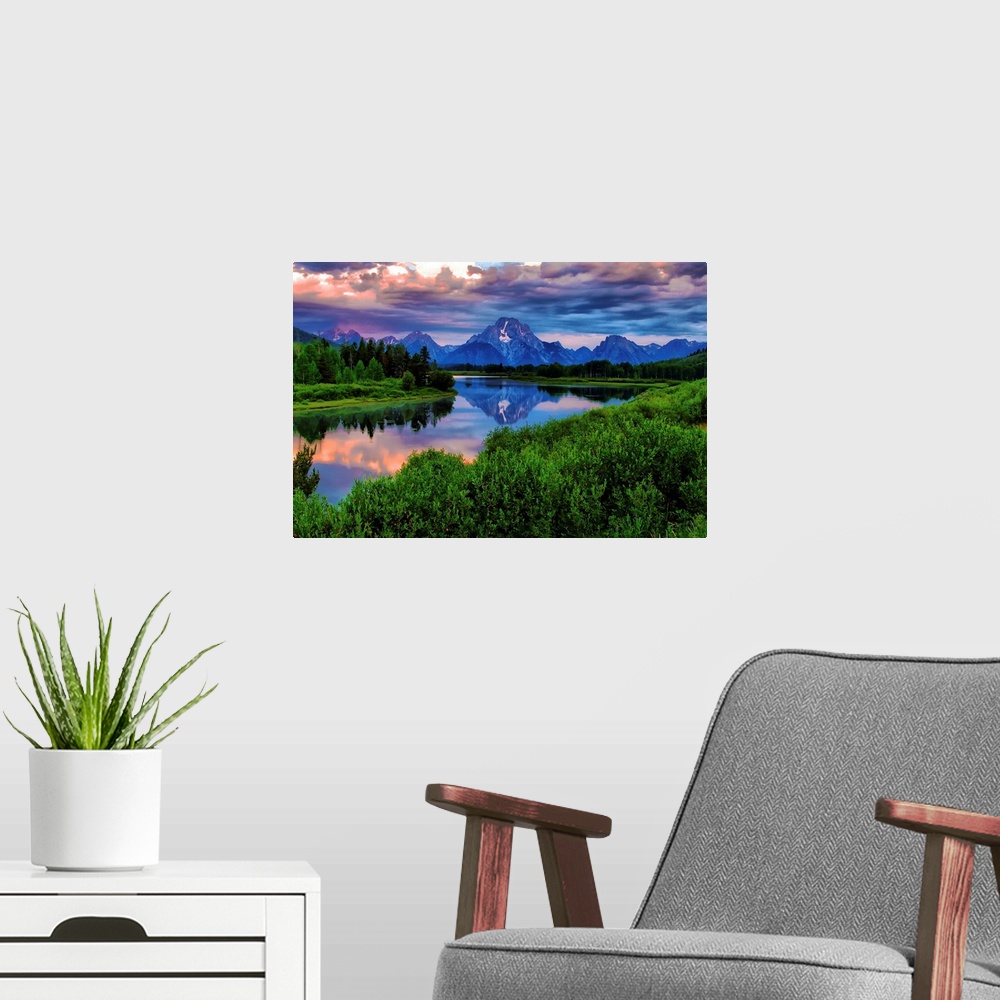A modern room featuring Giant, landscape photograph of morning light breaking through a stormy cloud cover over the Snake...