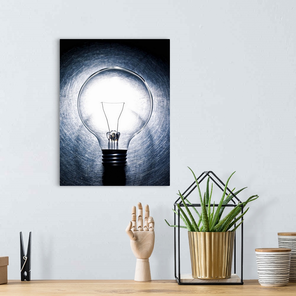 A bohemian room featuring Light Bulb on Stainless Steel Background.