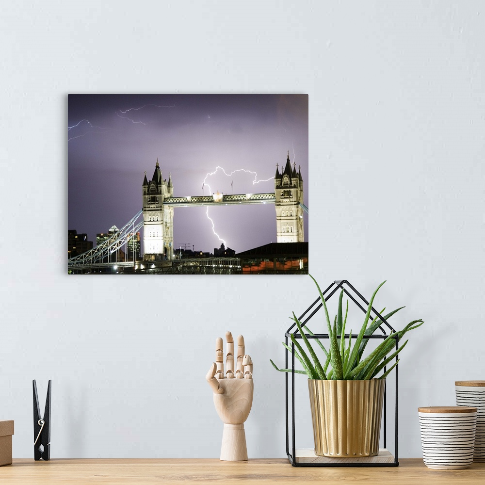 A bohemian room featuring Lightning storm over the city of London with Tower Bridge in the foreground