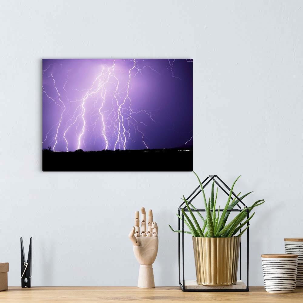 A bohemian room featuring Lightning Striking The Ground