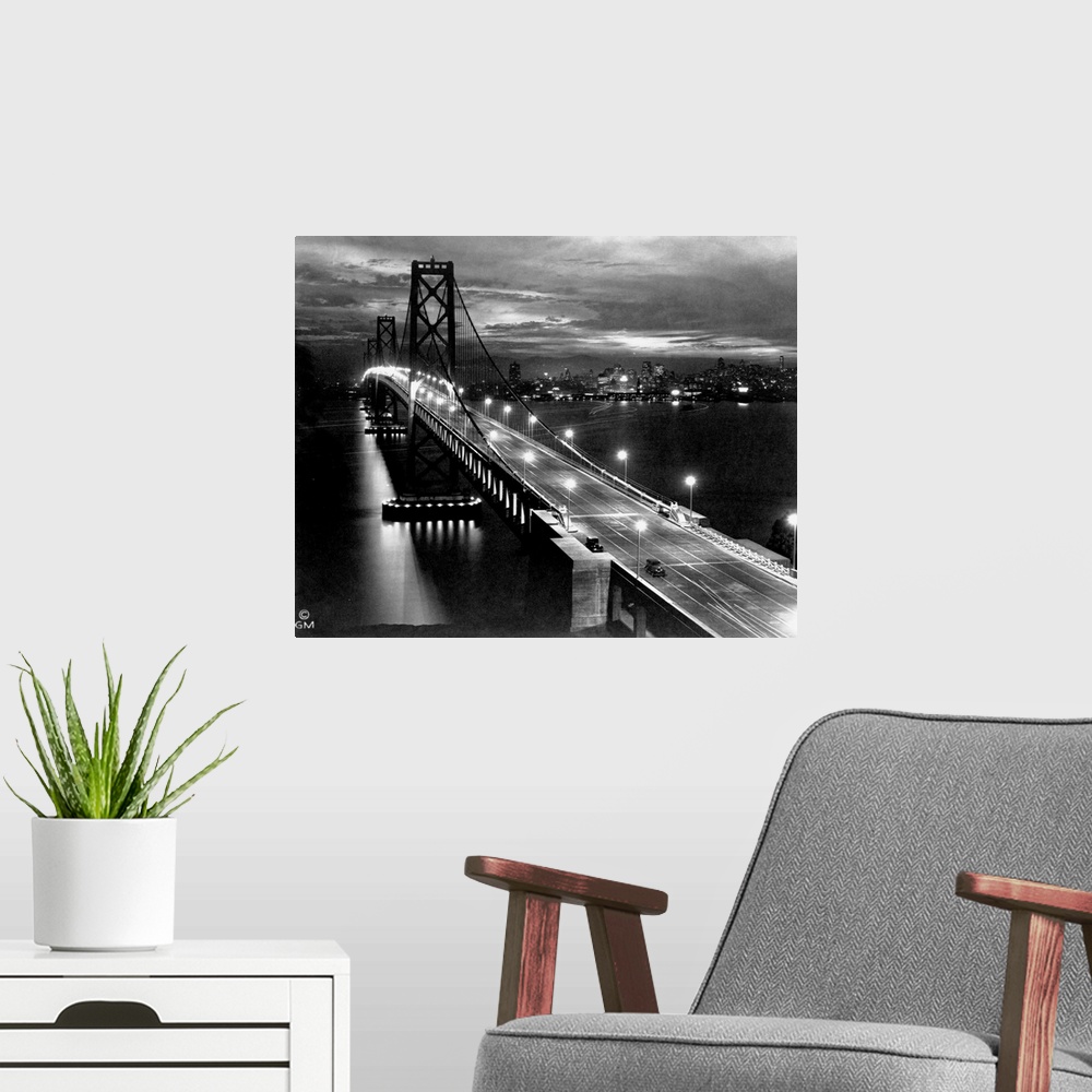 A modern room featuring Lights illuminate the San Francisco Oakland Bay Bridge after its completion in 1936. The bridge, ...