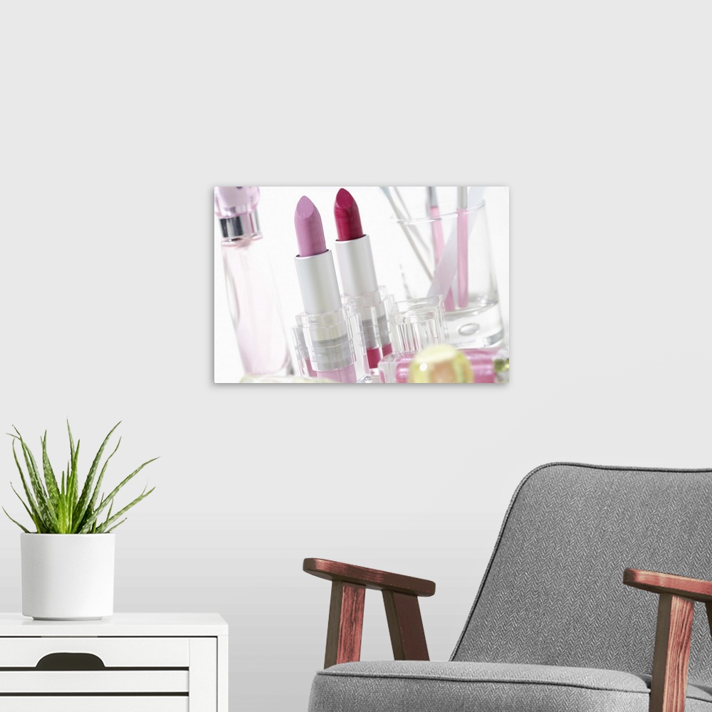 A modern room featuring Lipsticks and perfume bottles