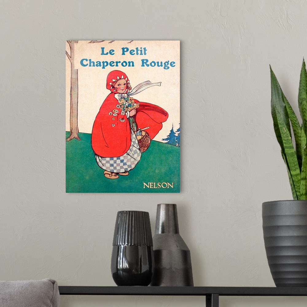 A modern room featuring Le Petit Chpaeron Rouge. Cover of childrens' book illustrated by Mabel Lucie Attwell.