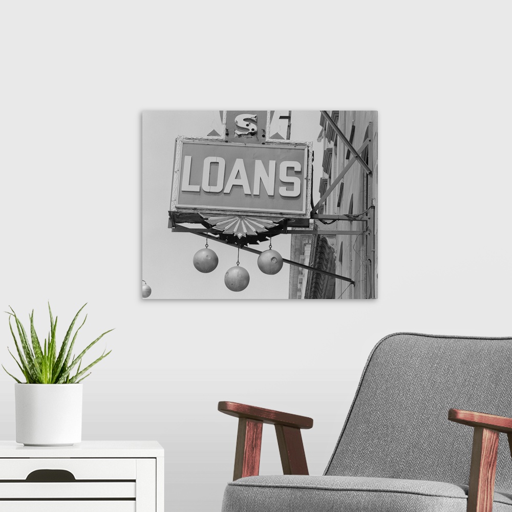 A modern room featuring Loans commercial sign, close-up