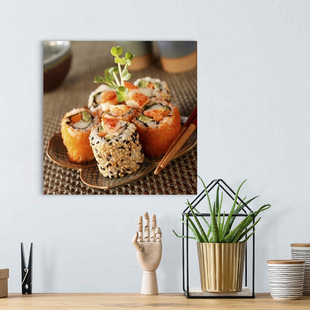 A bohemian room featuring Lobster sushi rolls on plate
