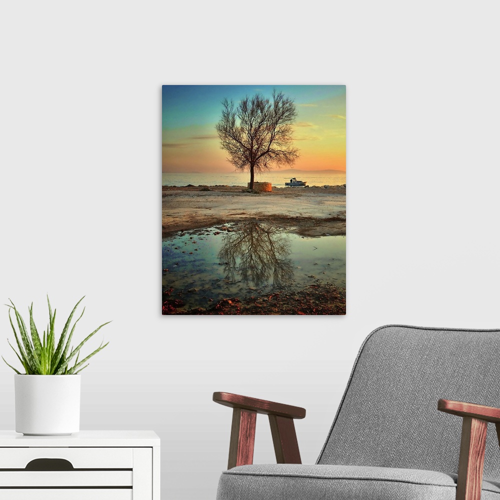 A modern room featuring After rain fisherman sailing out of port with lone tree reflection in water.