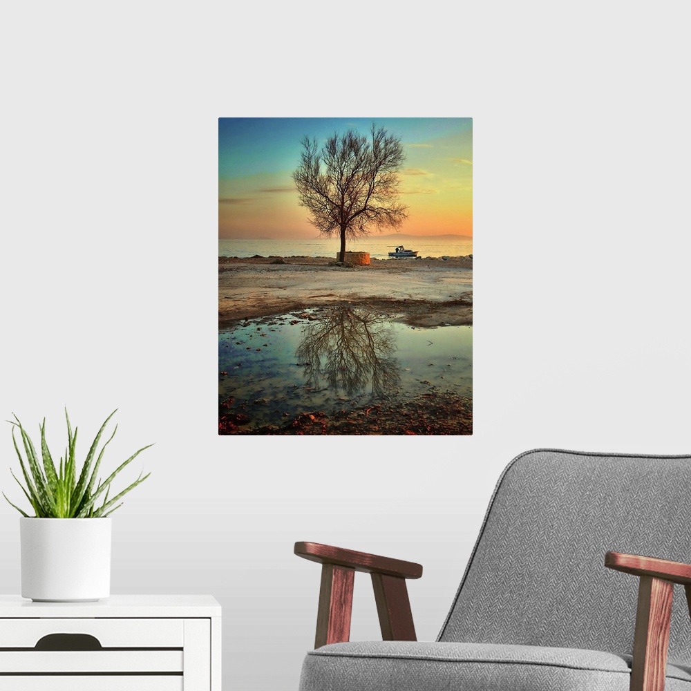A modern room featuring After rain fisherman sailing out of port with lone tree reflection in water.